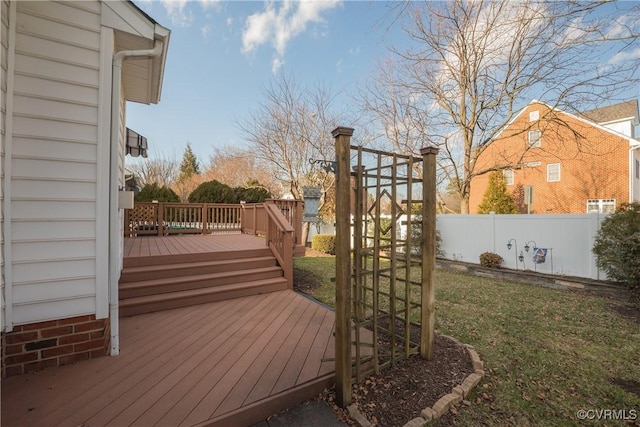 deck featuring a yard