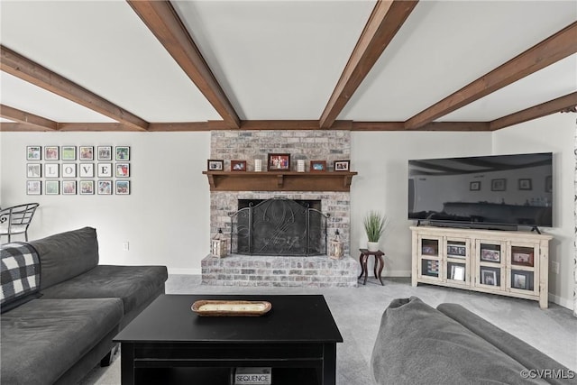 carpeted living room with beam ceiling and a brick fireplace