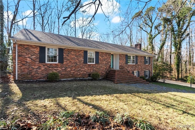 ranch-style house with a front lawn