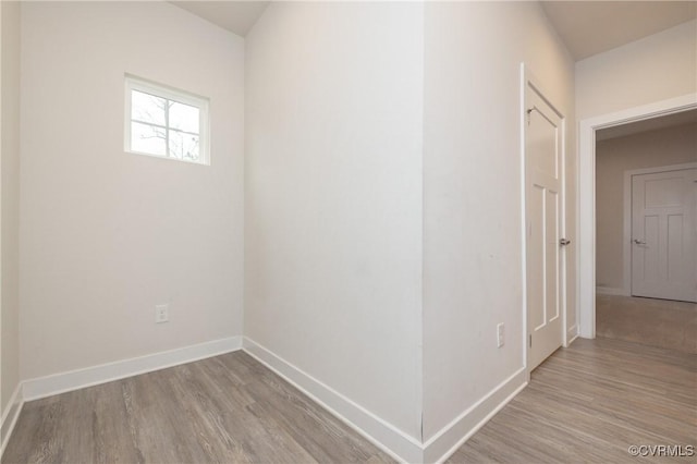 corridor featuring light hardwood / wood-style flooring