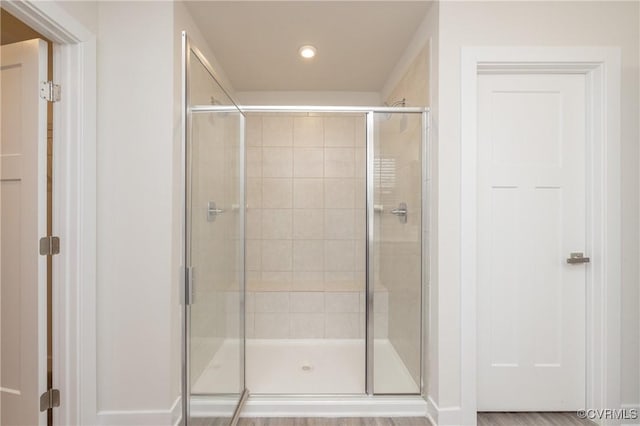 bathroom featuring an enclosed shower