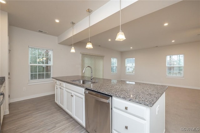 kitchen with sink, white cabinetry, decorative light fixtures, a center island with sink, and stainless steel dishwasher