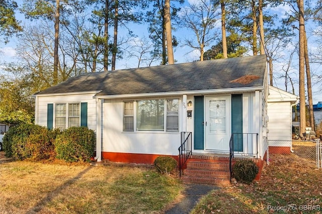 view of front of home with a front yard