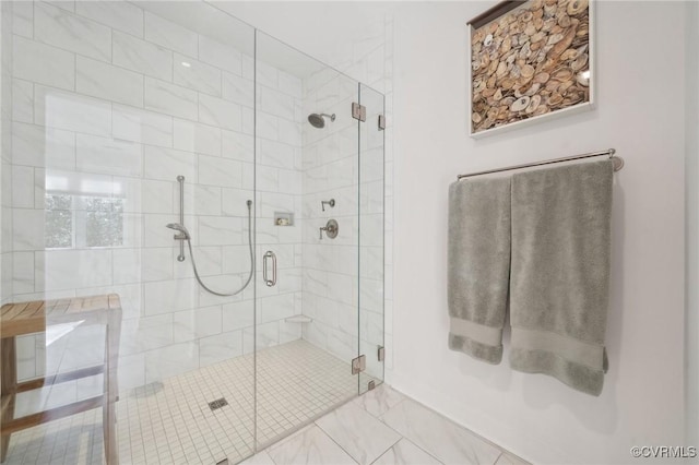 bathroom with a shower stall