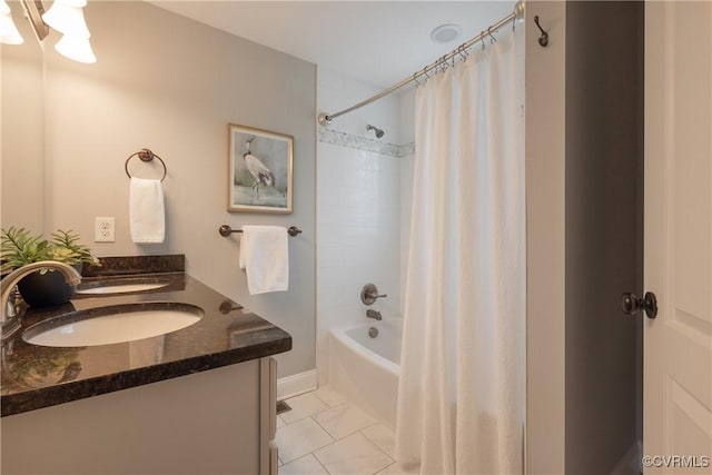 bathroom with shower / bathtub combination with curtain, vanity, and tile patterned floors