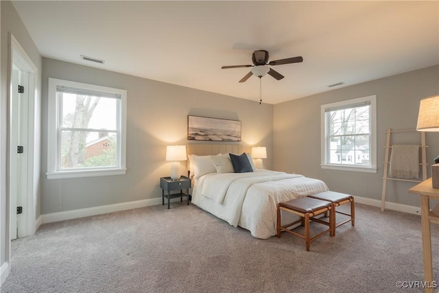 carpeted bedroom featuring ceiling fan