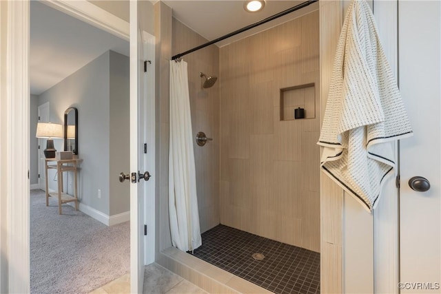 bathroom featuring tile patterned floors and walk in shower