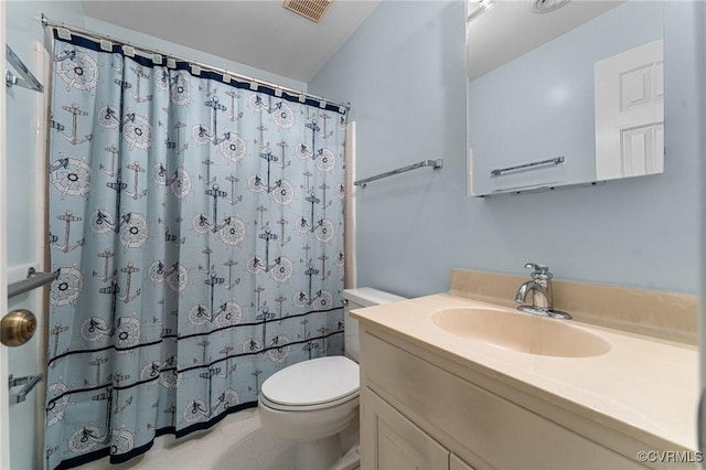 bathroom with vanity, toilet, and a shower with shower curtain