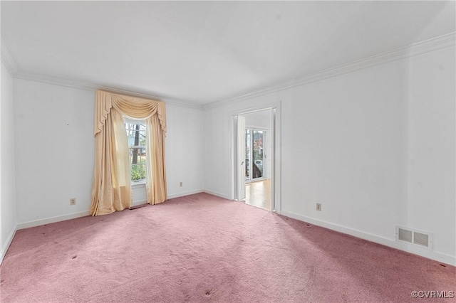 carpeted empty room featuring ornamental molding