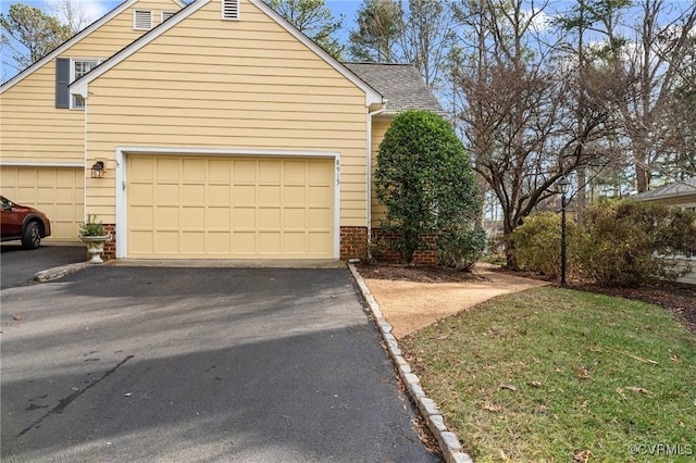 view of property exterior with a garage