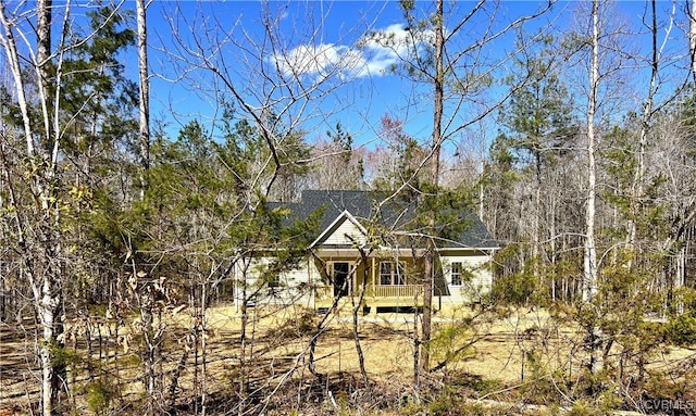 view of front facade with a shingled roof