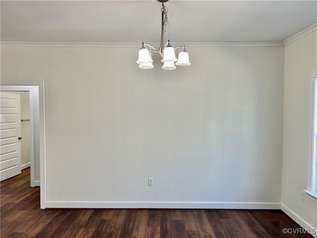 unfurnished room featuring an inviting chandelier, ornamental molding, dark wood-type flooring, and baseboards