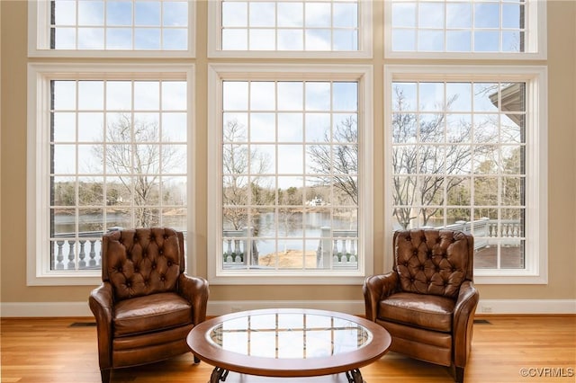 sitting room featuring light hardwood / wood-style floors