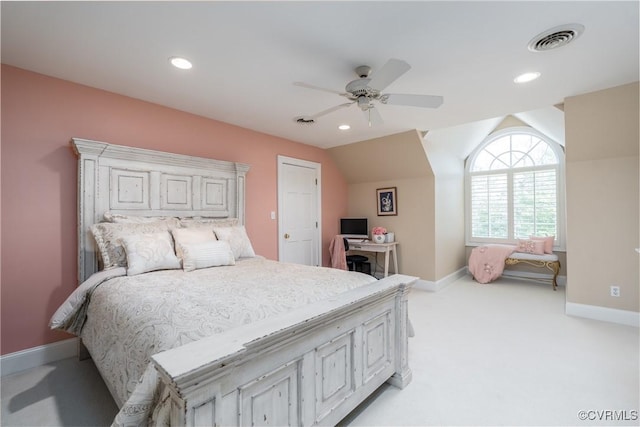 bedroom featuring lofted ceiling, light colored carpet, and ceiling fan