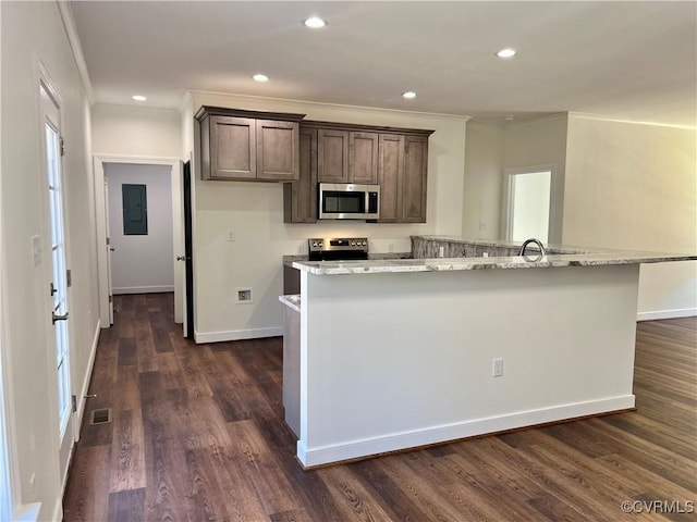 423 Bradshaw Rd, Rice, VA 23966 - kitchen with recessed lighting, dark wood-style flooring, ornamental molding, visible vents, and appliances with stainless steel finishes