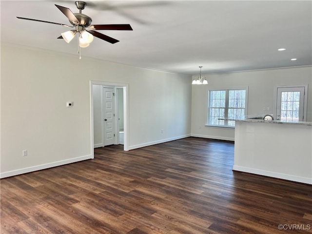 423 Bradshaw Rd, Rice, VA 23966 - empty room featuring dark wood-style flooring, crown molding, baseboards, recessed lighting, and ceiling fan with notable chandelier