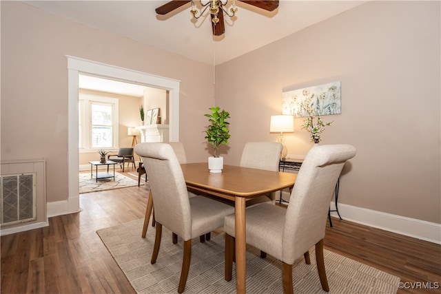 dining room with ceiling fan and wood-type flooring