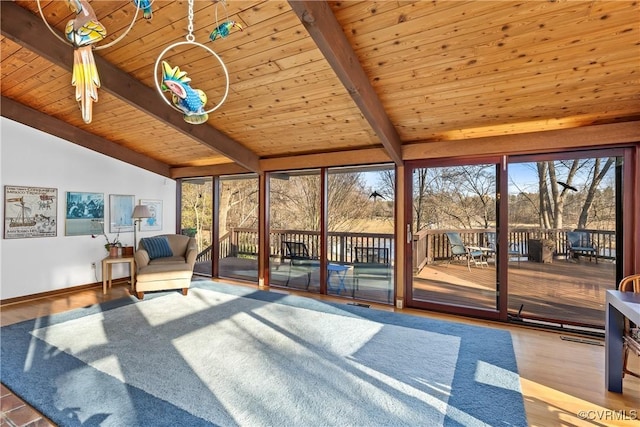 sunroom featuring wood ceiling and lofted ceiling with beams