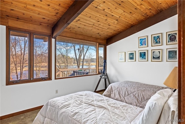 bedroom with wood ceiling, carpet floors, lofted ceiling with beams, and a water view