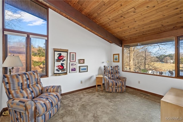 living area with wood ceiling, light colored carpet, a healthy amount of sunlight, and vaulted ceiling with beams