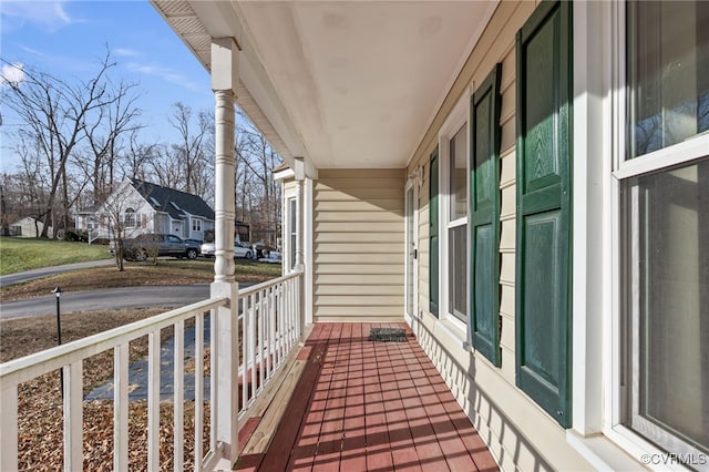 balcony featuring a porch