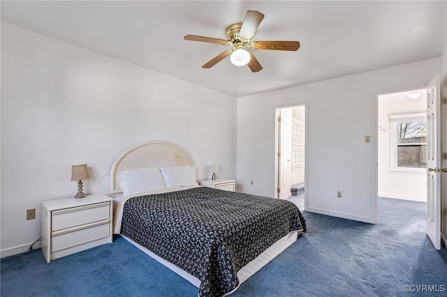 bedroom with ceiling fan and dark colored carpet