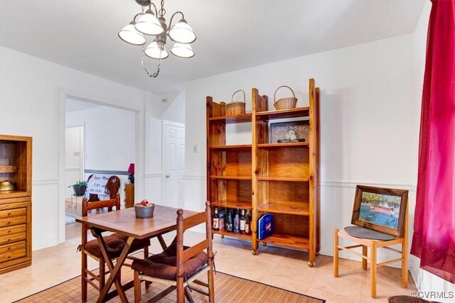 1270 Riverview Dr, West Point, VA 23181 - dining room featuring a chandelier and light flooring