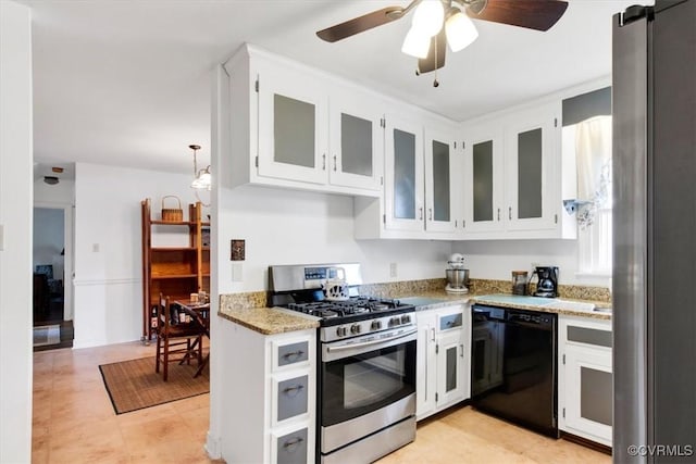 1270 Riverview Dr, West Point, VA 23181 - kitchen featuring stainless steel appliances, a ceiling fan, white cabinets, and light stone countertops