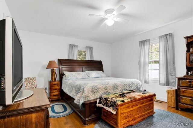 1270 Riverview Dr, West Point, VA 23181 - bedroom featuring wood finished floors and a ceiling fan