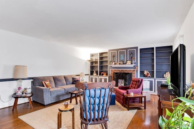 1270 Riverview Dr, West Point, VA 23181 - living room with wood finished floors and a fireplace
