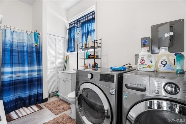 laundry area featuring washing machine and dryer