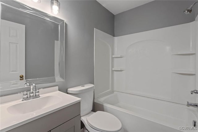 full bathroom with vanity, bathing tub / shower combination, and toilet