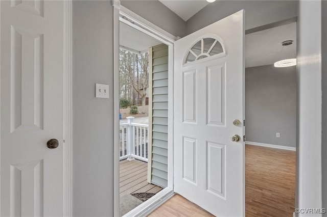 entrance foyer with hardwood / wood-style floors