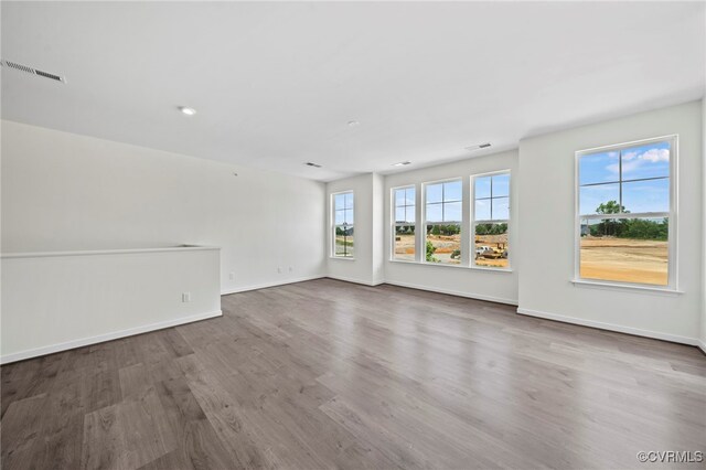 3817 Maze Runner Dr, Midlothian, VA 23112 - unfurnished living room with wood-type flooring