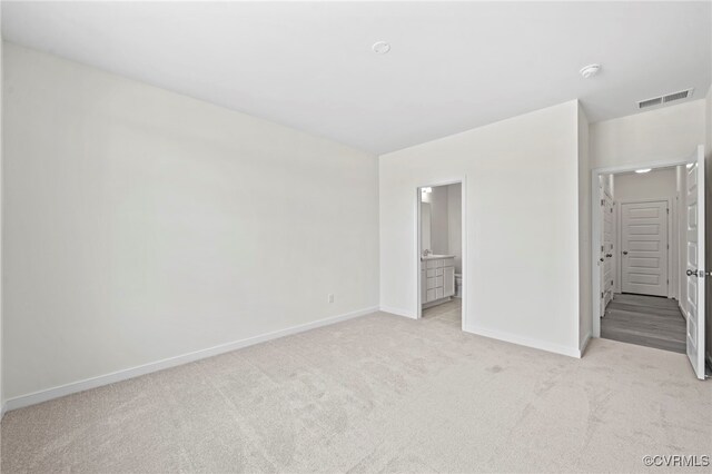 3817 Maze Runner Dr, Midlothian, VA 23112 - unfurnished bedroom featuring ensuite bathroom and light carpet