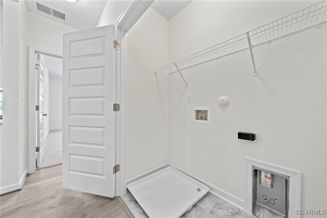 3817 Maze Runner Dr, Midlothian, VA 23112 - washroom featuring hookup for a gas dryer, electric dryer hookup, washer hookup, and light hardwood / wood-style floors