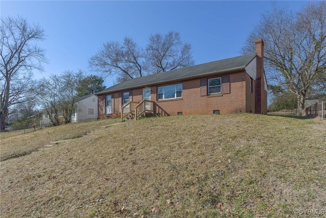 ranch-style home featuring a front yard