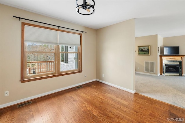 empty room featuring hardwood / wood-style floors