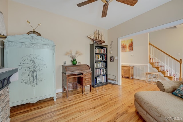 sitting room featuring hardwood / wood-style flooring and ceiling fan