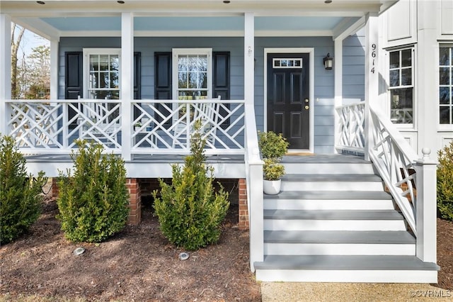 doorway to property with a porch