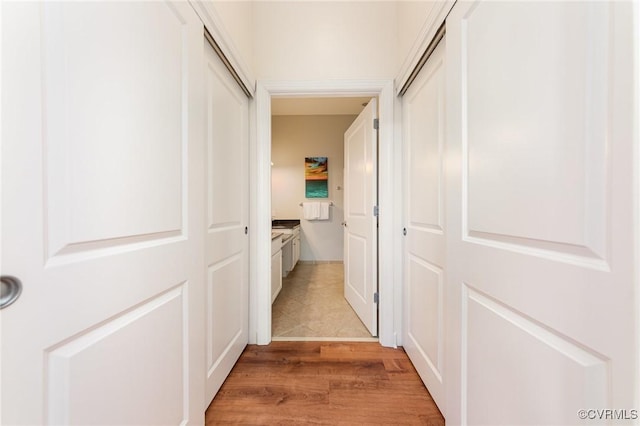 hallway featuring light hardwood / wood-style floors