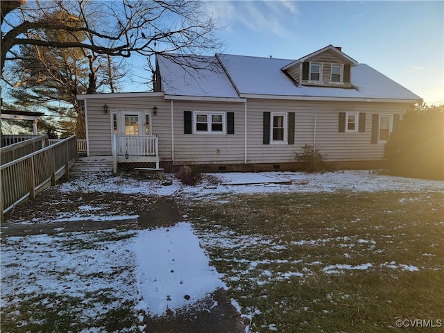 view of snow covered house