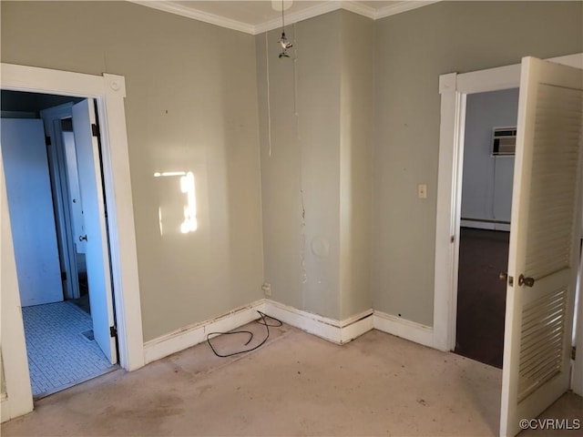 unfurnished room featuring crown molding, a wall unit AC, and a baseboard radiator