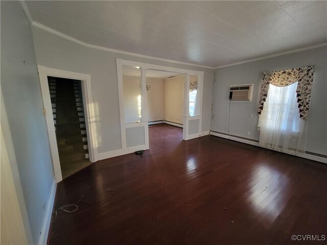 entrance foyer featuring a baseboard radiator, ornamental molding, dark hardwood / wood-style floors, and an AC wall unit