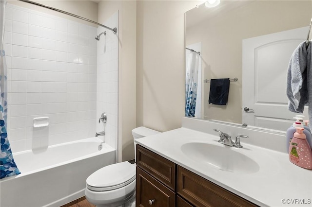 full bathroom with vanity, toilet, and shower / tub combo