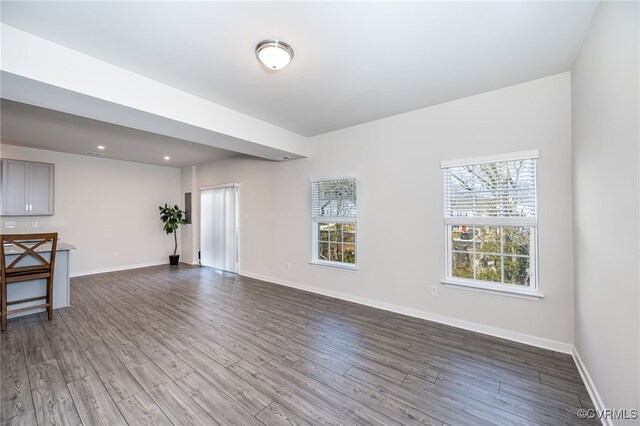 empty room with hardwood / wood-style floors