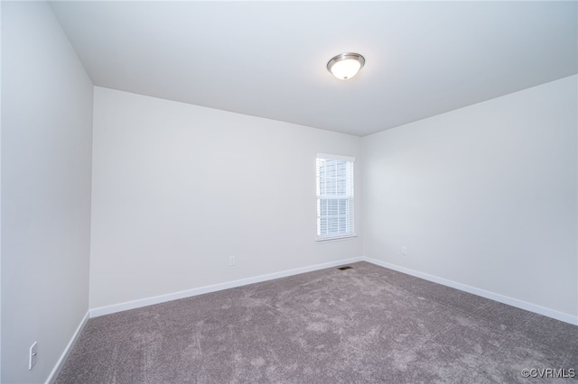 unfurnished room featuring carpet flooring