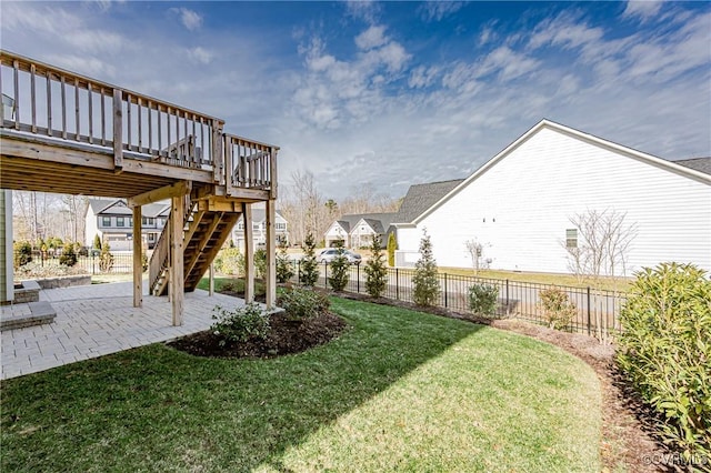 view of yard with a patio and a wooden deck