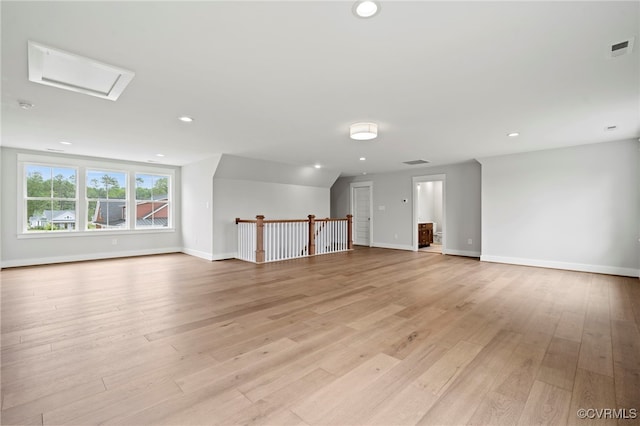 spare room featuring light hardwood / wood-style floors