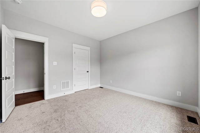 unfurnished bedroom with carpet floors